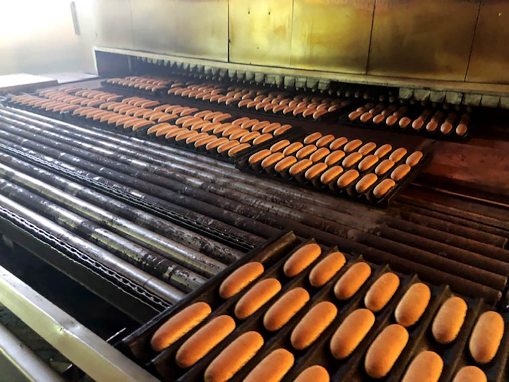 Tray / strap handling system